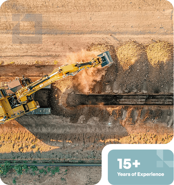 Heavy construction excavator digging and moving earth at a construction site.